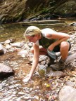 Sim feeds fish.JPG (93 KB)